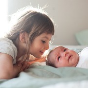 5 Moves to Help Your Older Child Bond with Your Newborn