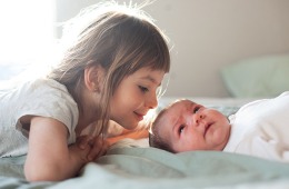5 Moves to Help Your Older Child Bond with Your Newborn